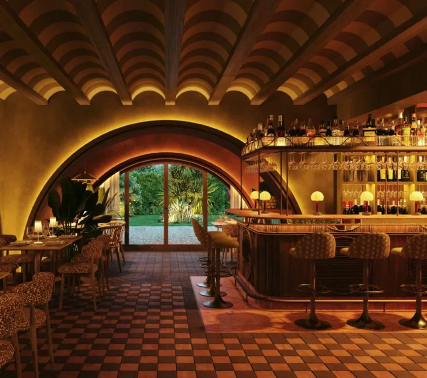 Bar con techo abovedado y suelo de baldosas