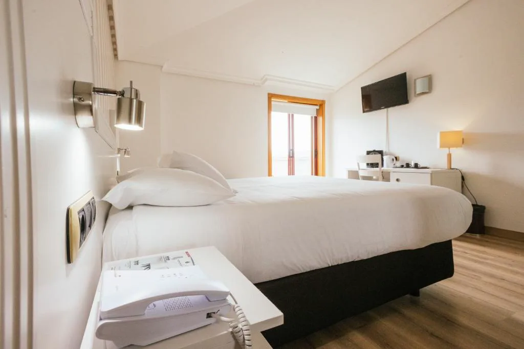 Habitación doble luminosa con balcón, Hotel Alfonso I