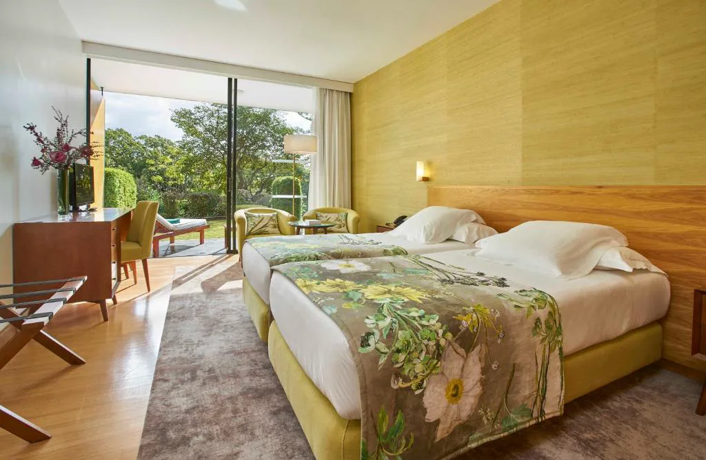 Habitación con terraza al jardín en Quinta da Casa Branca